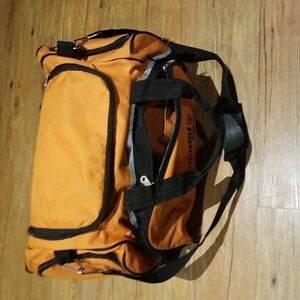 Multiple zippered pockets duffle EUC